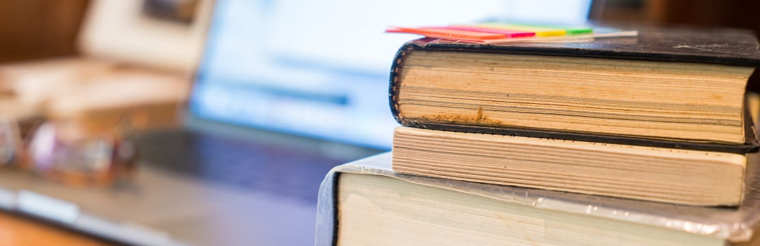 Studying desk with books and notebook