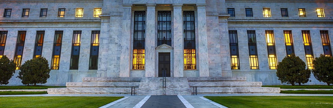 Federal Reserve building illuminated at night